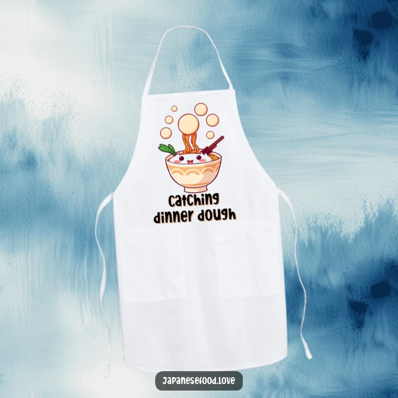 Funny kitchen apron with a playful ramen bowl character catching dango balls, ideal for cooking enthusiasts.