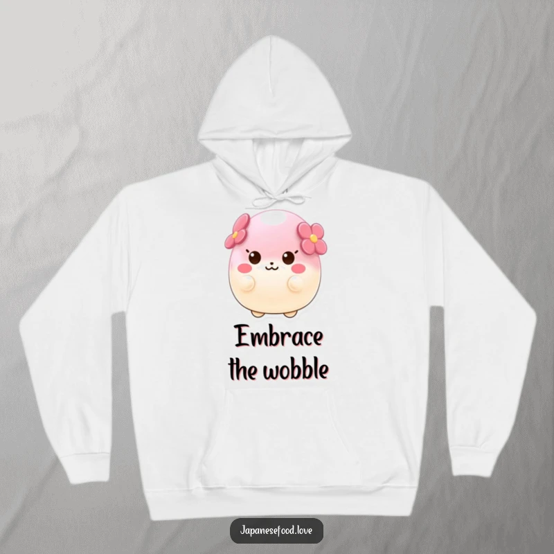 Funny hoodie depicting a wobbly sakura mochi character wobbling joyfully, offering ultimate comfort and a touch of sweet delight.