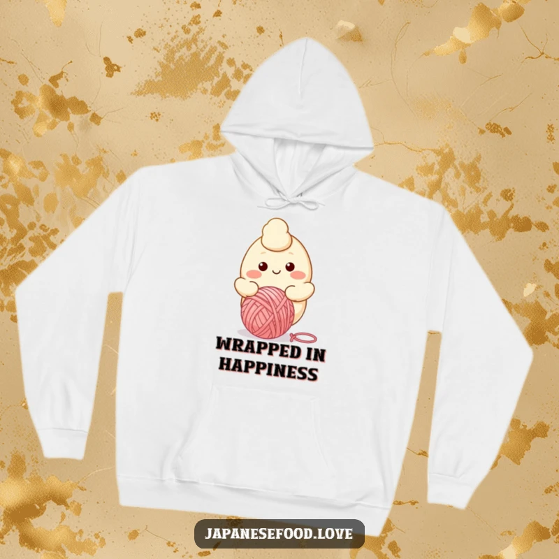 Funny hoodie design showcasing a smiling dumpling character in the act of happily bouncing a colorful ball of yarn.