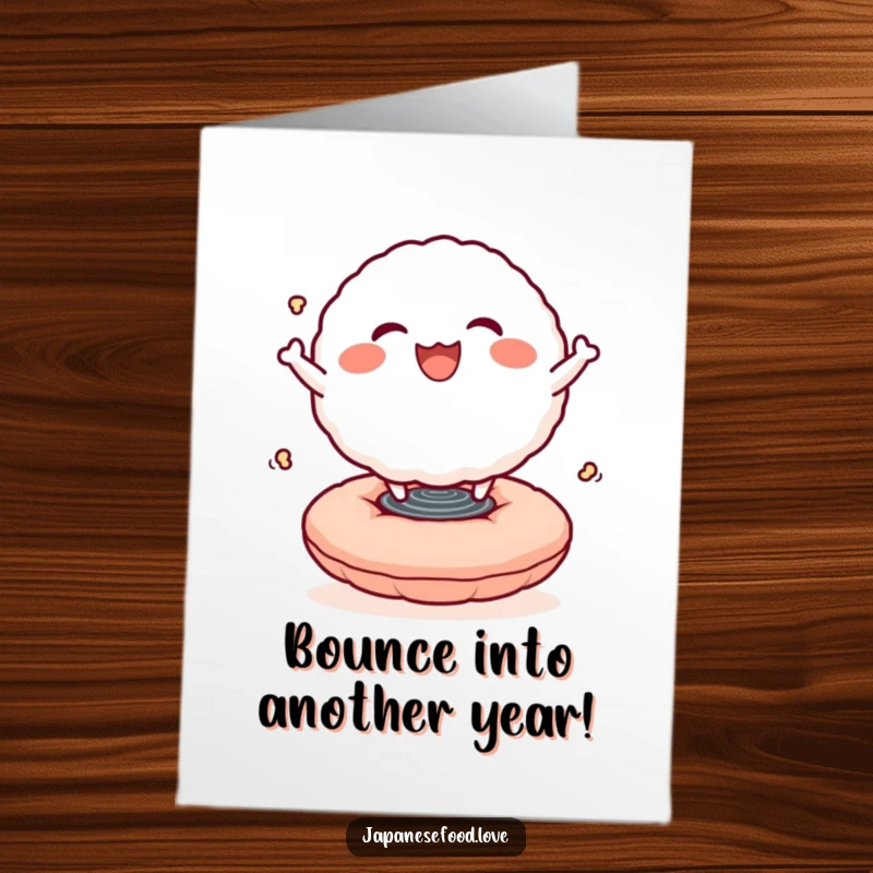 Funny Free Printable Rice Ball Birthday Card: Smiling character joyfully bouncing high on a springy cushion.