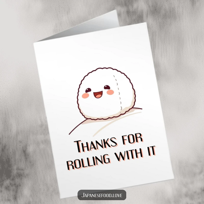 Funny Free Printable Thank You Card: A grinning onigiri rice ball sliding gently down a smooth slope.