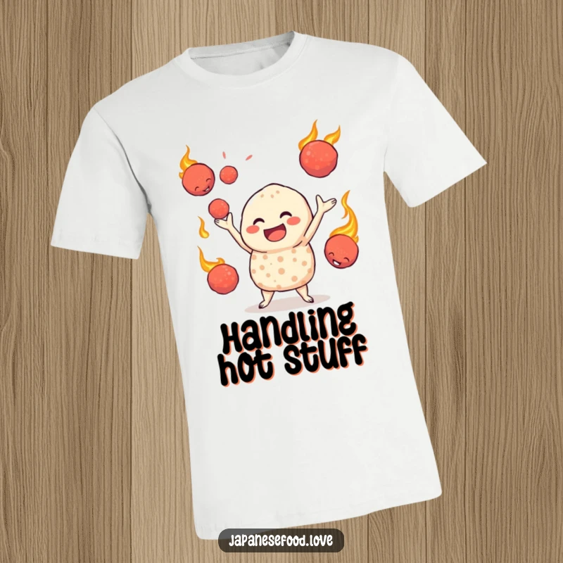 Funny T-shirt depicting a jovial takoyaki character juggling very hot, fiery octopus balls, showcasing daring culinary entertainment.